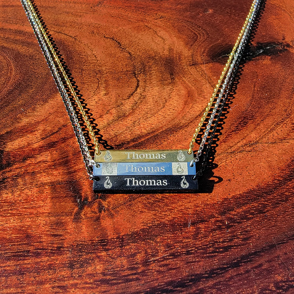 Makau tribal engraved horizontal bar pendant in stainless steel with customizable engraving up to 11 characters