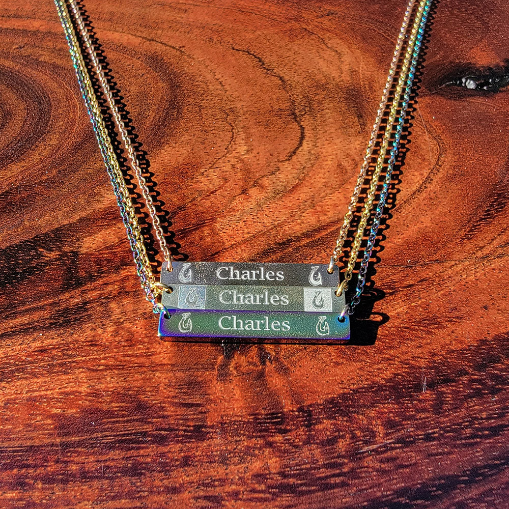 Makau engraved horizontal bar pendant in stainless steel with customizable text